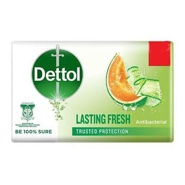 Dettol soap bar with green and white packaging on a white background